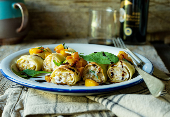 Cannelloni ripieni di ricotta, spinaci e funghi con dadolata di zucca